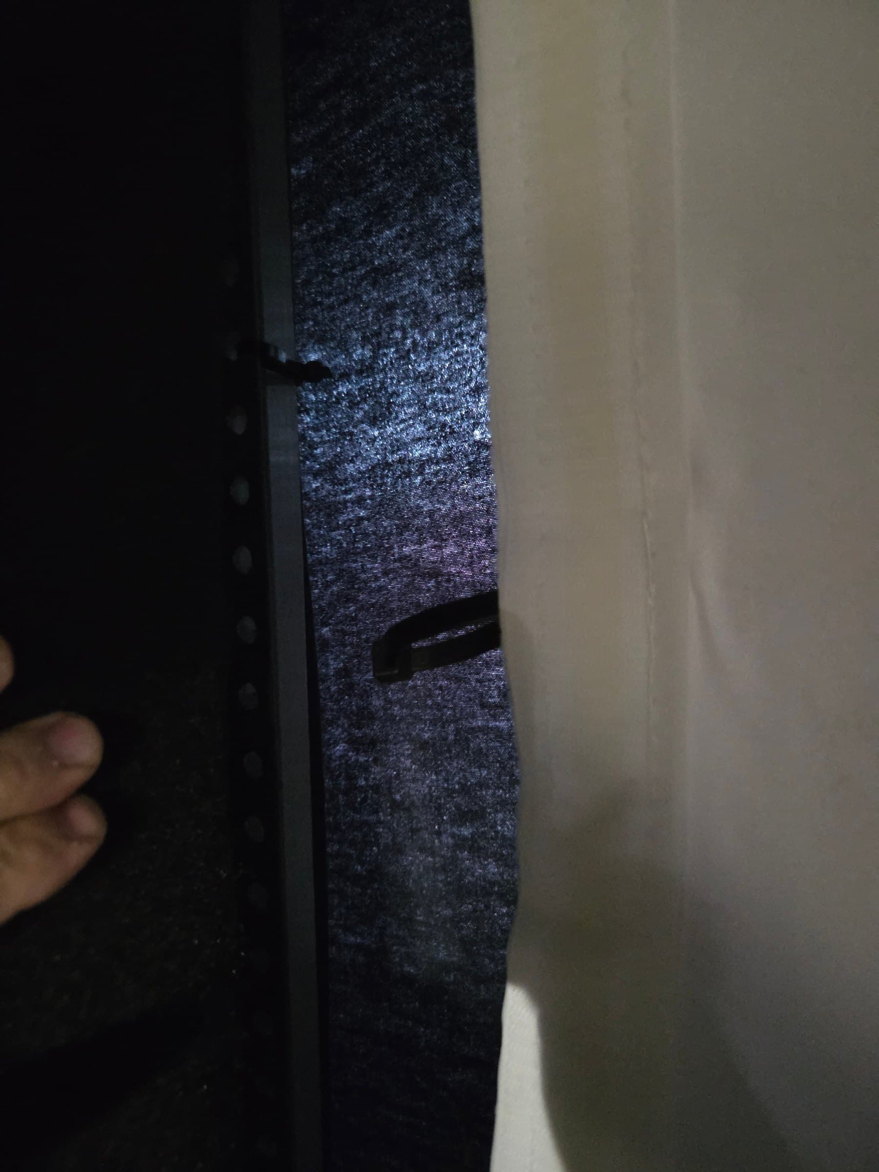 Plastic zip ties to golf the impact screen. Improperly installed and secured.